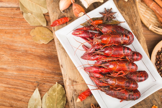 Crayfish. Red boiled crawfishes on table in rustic style,  Lobster closeup. 