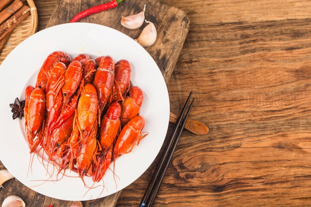 Crayfish. Red boiled crawfishes on table in rustic style,  Lobster closeup.