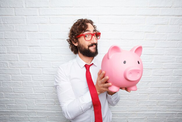 Crazy businessman expressing a concept. brick wall background