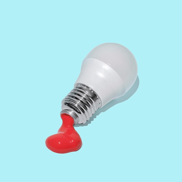 A crazy light bulb and a tube of leaking paint were surreal