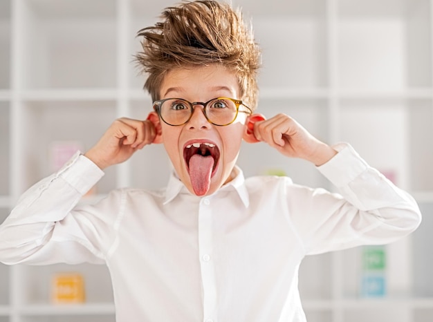 Crazy little scientist grimacing at lab