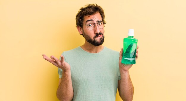 Crazy man with a mouth wash bottle