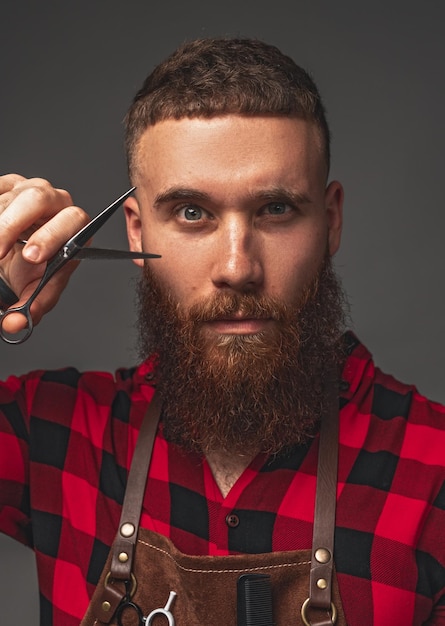 Crazy modern hairdresser with scissors