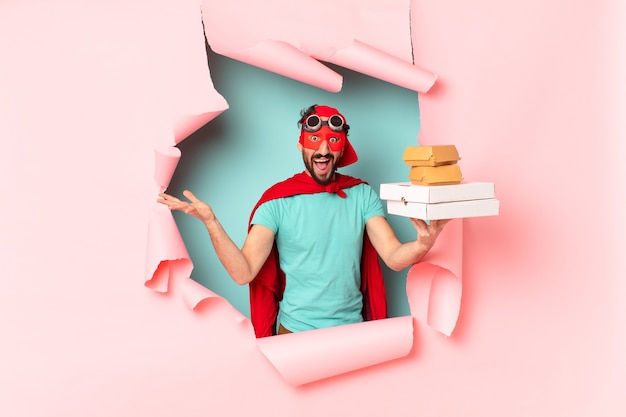 Crazy  super hero man happily and proud take away fast food concept