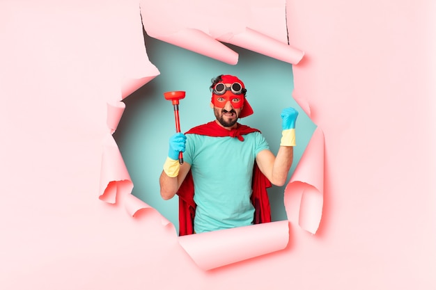 Crazy  super hero man. housekeeping concept