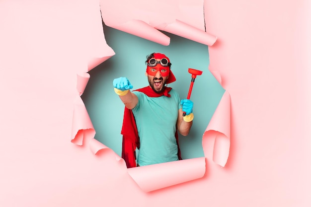 Crazy  super hero man housekeeping concept