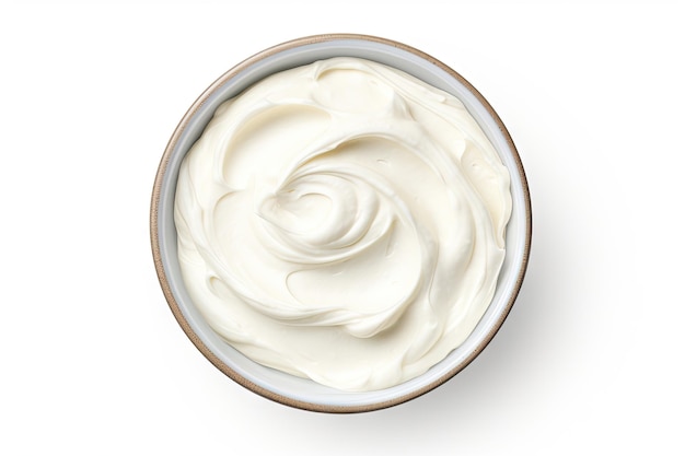 Cream cheese in bowl white background top view