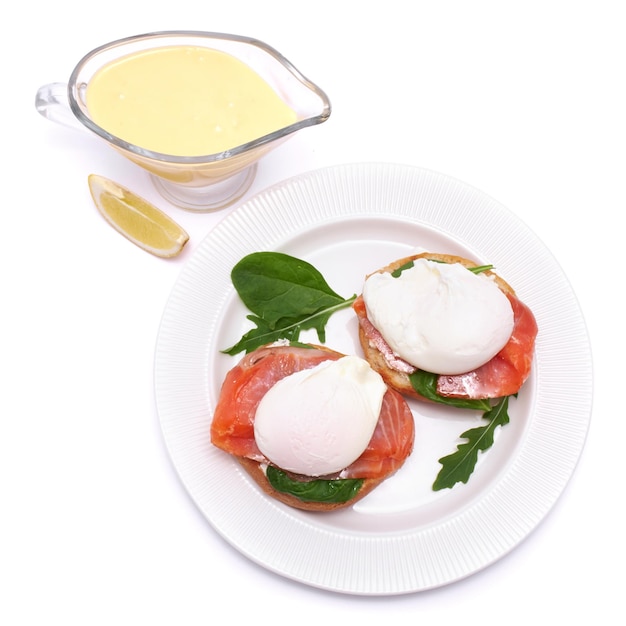 Cream cheese Smoked salmon and poached egg toasts on a plate