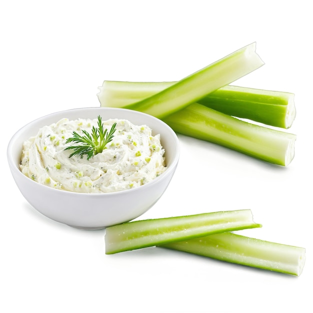 Cream cheese soft white spread piped into celery sticks sprinkled with paprika culinary and food