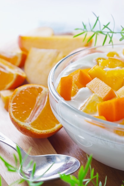 Cream cottage cheese with sliced persimmons