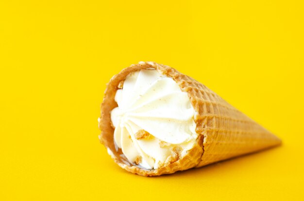 Cream ice cream horn.