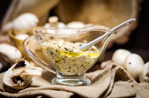 Cream of mushroom sauce in a glass sauceboat