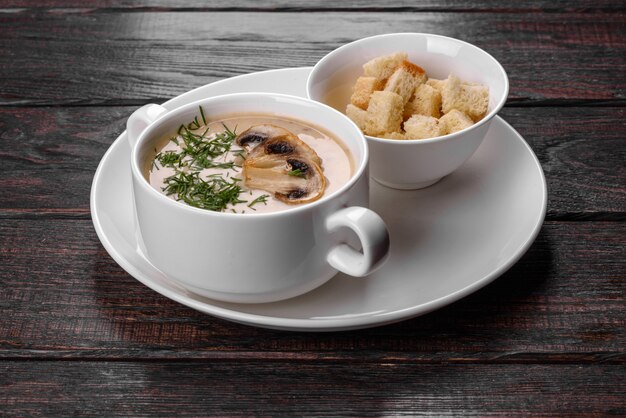 Cream of mushroom soup. Home-made with whole and sliced mushrooms