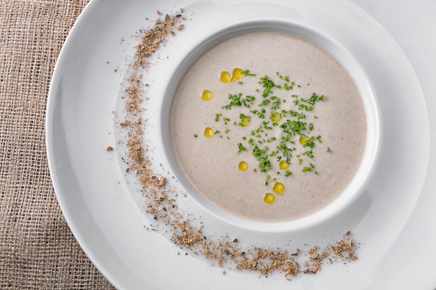 Cream soup of mushrooms with herbs and spices