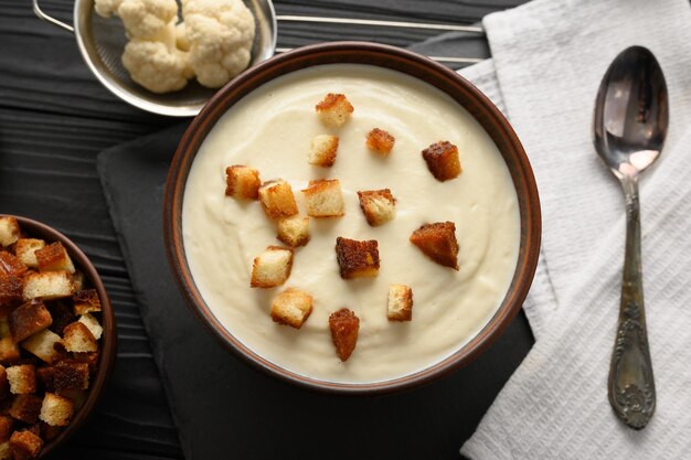 Creamy cauliflower soup with homemade croutons