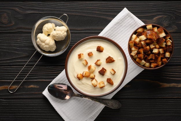 Creamy cauliflower soup with homemade croutons
