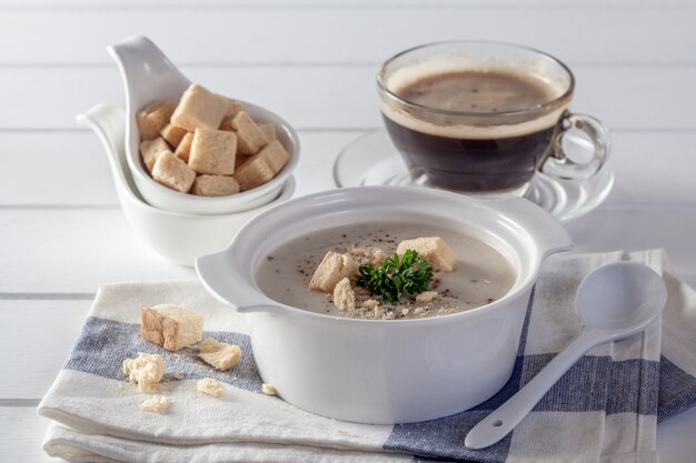 Creamy chicken and vegetables on a white wooden table