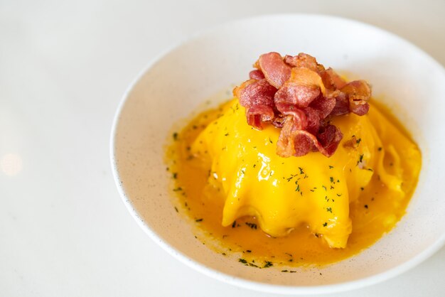 creamy egg on rice with bacon