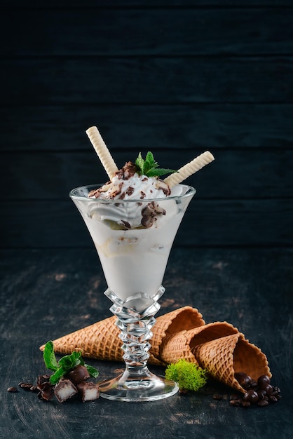 Creamy ice cream On a black wooden background Copy space