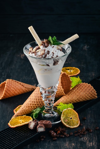 Creamy ice cream On a black wooden background Copy space