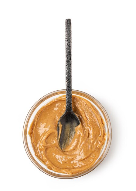 Creamy peanut butter in spoon
