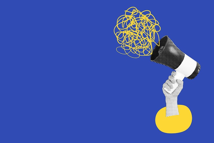 Foto creatief ontwerp megafoon op blauwe achtergrond met ruimte voor tekst