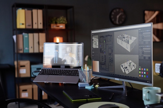 creating architectural designs on computer screen in office