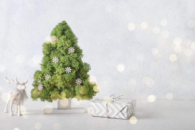 Creative alternative Christmas tree decorated green moss DIY