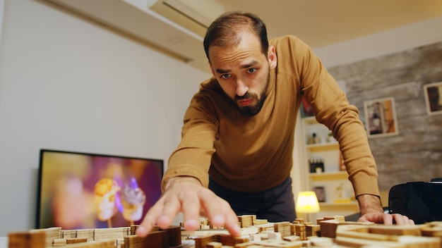 Photo creative architect in his home office working on a big project for the city. building models.