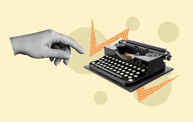 Creative arm typing on retro typewriter