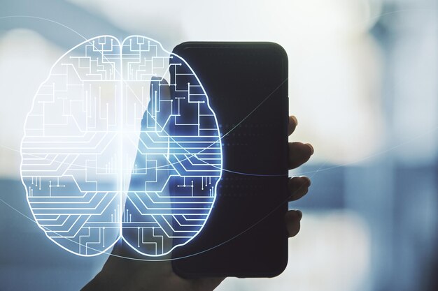 Creative artificial Intelligence concept with human brain hologram and hand with phone on background Multiexposure