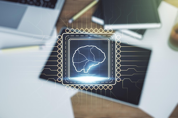 Foto concetto creativo di intelligenza artificiale con schizzo del cervello umano e moderna tavoletta digitale sul desktop su sfondo vista dall'alto doppia esposizione