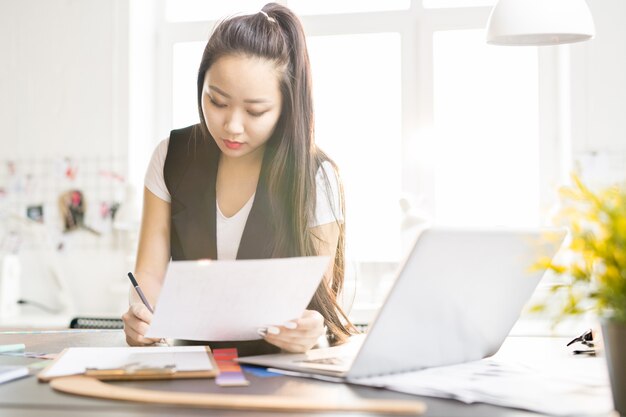 Creative Asian Woman Working in Design Studio