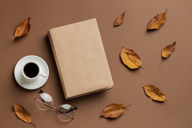 Photo creative assortment with different books and a cup of cofee