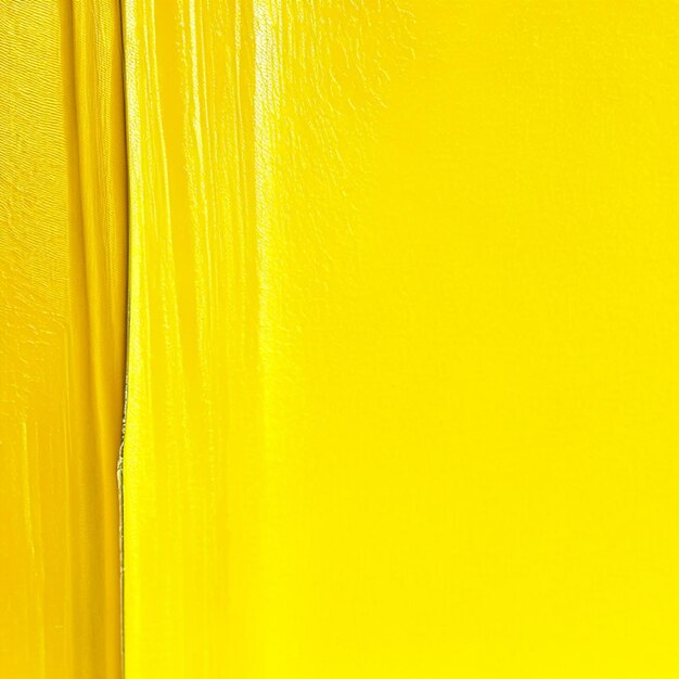 Creative background with rough yellow painted texture