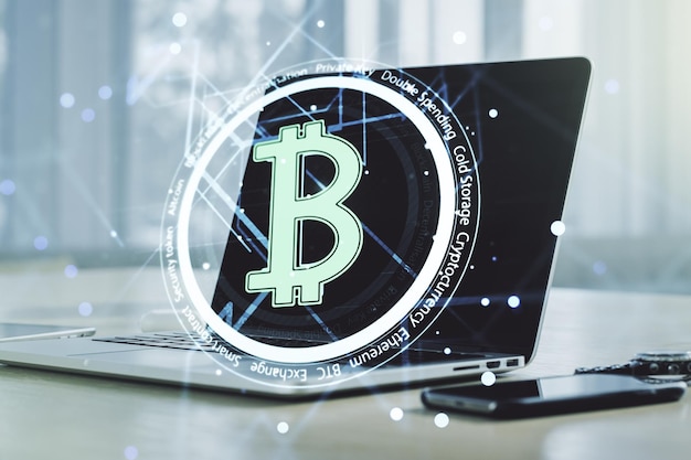 Creative Bitcoin concept with modern laptop background Multiexposure