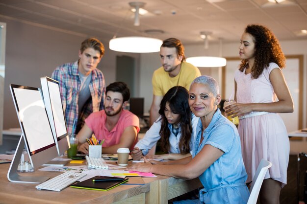 Creative business team discussing in office