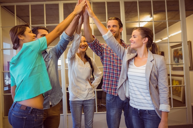 Photo creative business team waving their hands