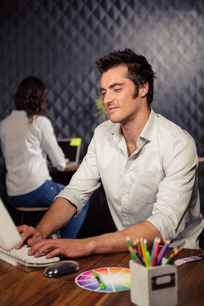 Creative businessman working on computer