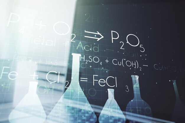 Creative chemistry concept on modern laptop background Multiexposure