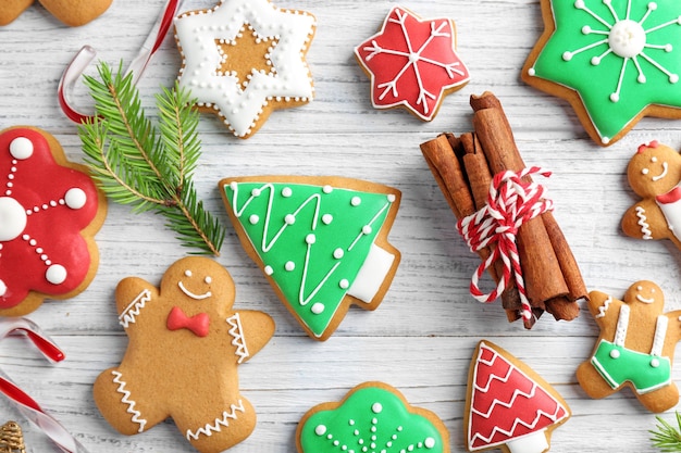 Creative Christmas cookies on wooden background