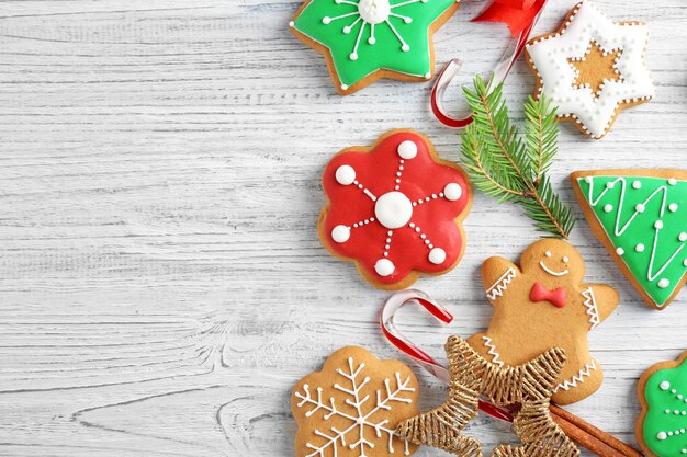 Creative Christmas cookies on wooden background