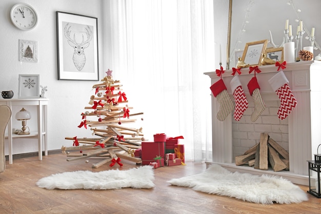 Creative Christmas tree in living room interior