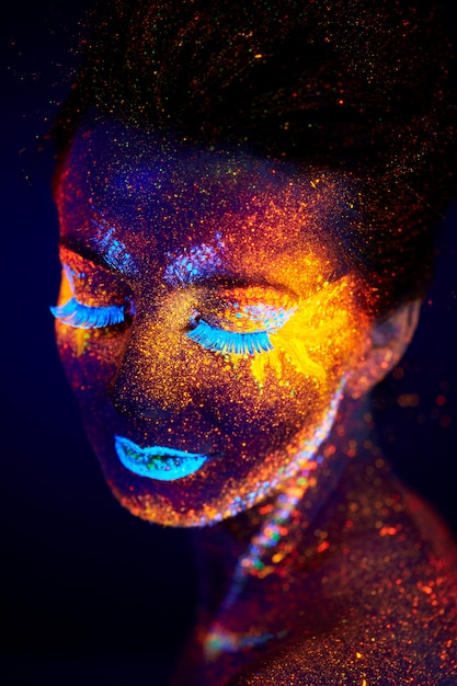 creative close up uv portrait with hot sun and stars, red yellow blue orange art