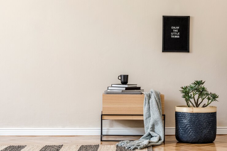Creative composition of stylish hall /living room interior design with wooden commode and accessories.