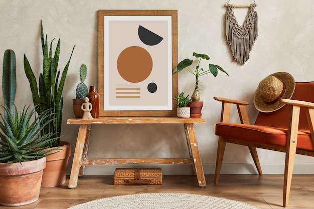 Creative composition of stylish living room interior with mock up poster frame, armchair, cacti and personal and boho accessories. Plant love and nature concept. Template.