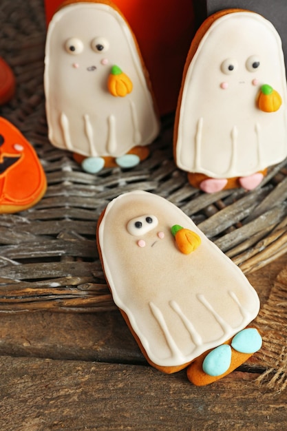 Photo creative cookies for halloween party on wicker plate