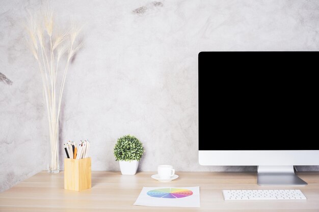 Creative desk with computer monitor