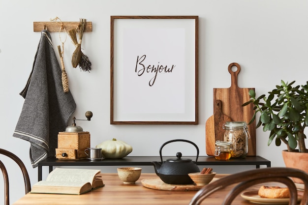 Creative dining room interior design with mock up poster frame, family dining table, black console and retro inspired personal accessories. Copy space. Template. Autumn vibes.