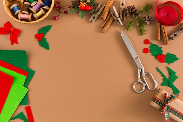 Premium Photo | Creative diy xmas hobby background. handmade tools for  making christmas present and trappings, flat lay style. top view of craft  paper table with copy space, decoration of gift.